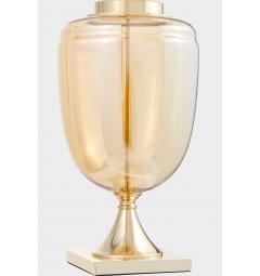 La lampada da tavolo o comodino OLIMPIA con paralume bianco un mix di tre materiali vetro dorato, metallo e tessuto ignifugo.