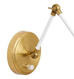 Particolare attacco a parete in metallo ottone applique